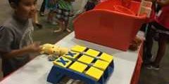 fall 2 a child playing a giant tic tac toe came