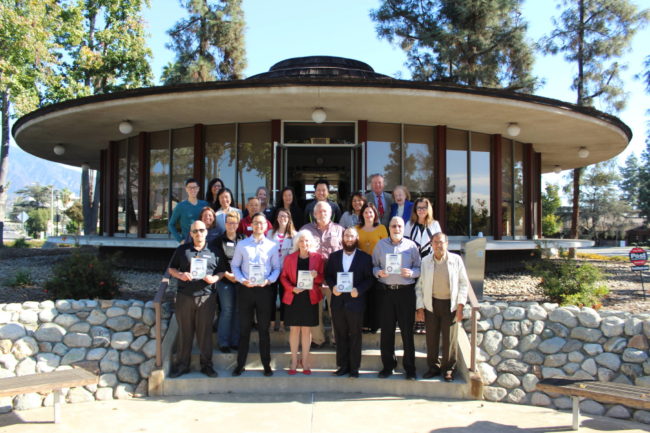 IMG_6102 a group of people standing on the back steps of the Arcadia Chamber building