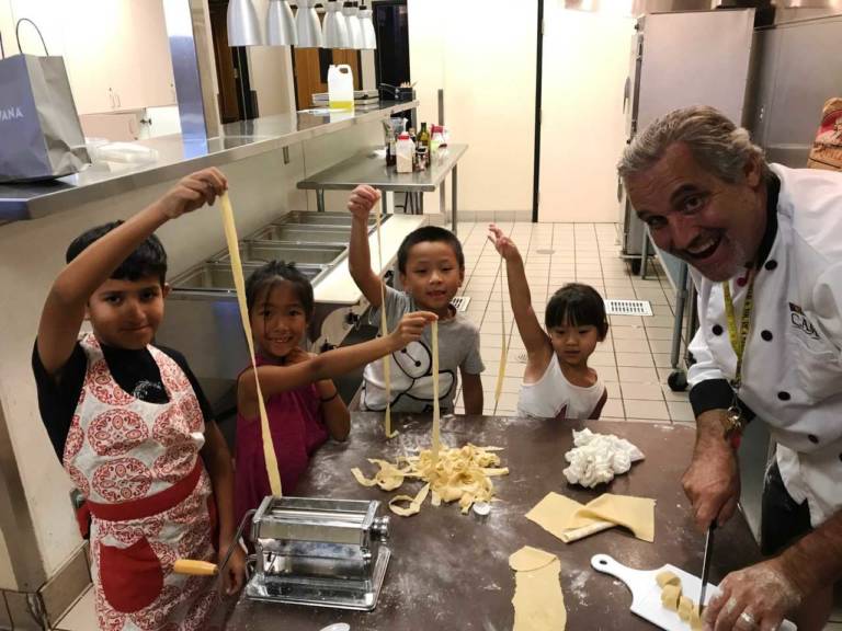 City of Arcadia Rec Dept a group of children making pasta with a chef