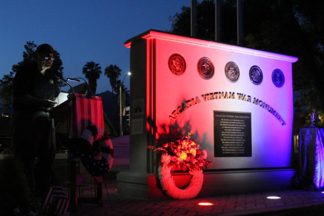 the Arcadia Vietnam War Monument lit up with colors of red, white and blue