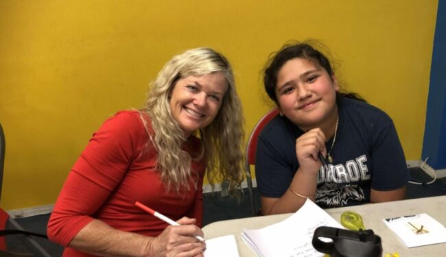 Denise weaver reading with Boys & Girls Club