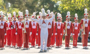 the Arcadia high School band with their drum major 