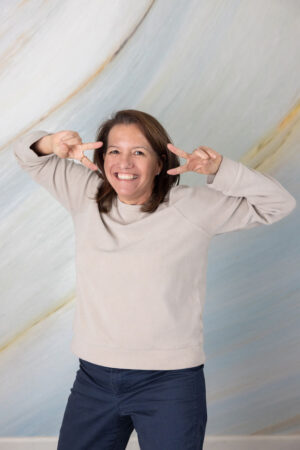 Christine Zito funny pose for profile picture.