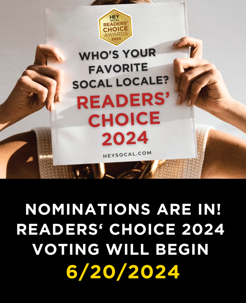 nominations open for Hey Media's Reader's Choice awards flyer showing two hands holding a piece of paper 