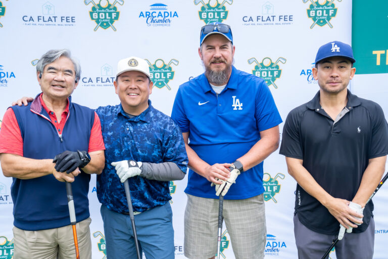 a group of four golfers from the Steve Rhee team