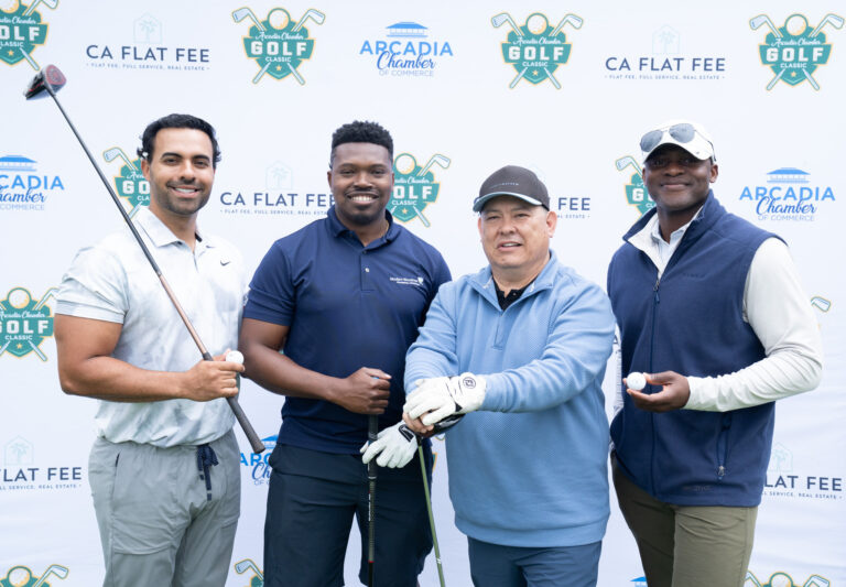 a group of four golfers from Modern Woodmen