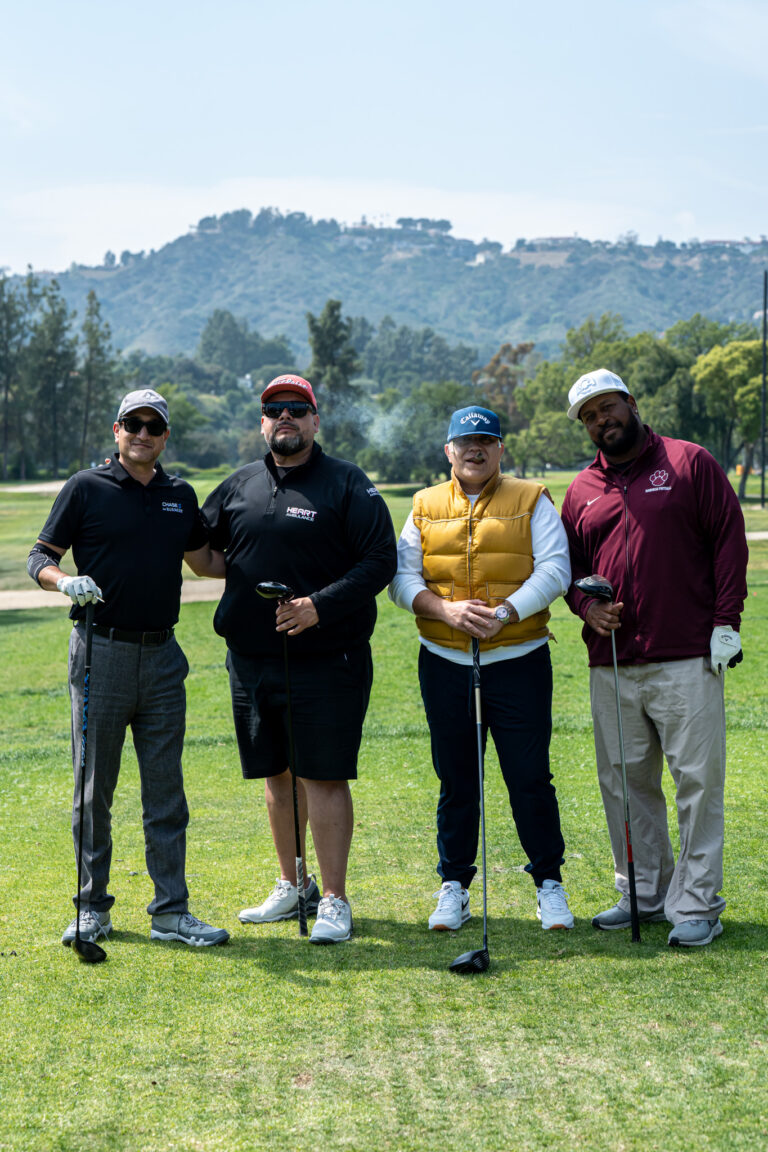 a group of four golfers from Heart Ambulance