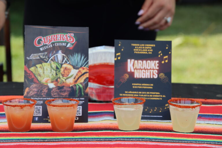 four margaritas with Tahine on the rim set before cards advertising for Cabrera's Mexican Cuisine