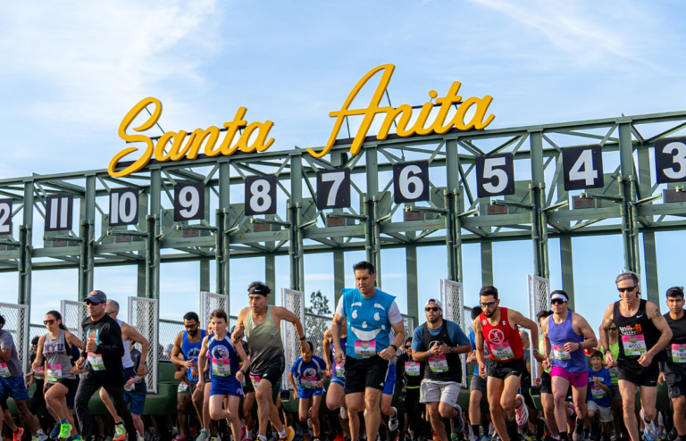 runners exit the starting gate at the Santa Anita 5K