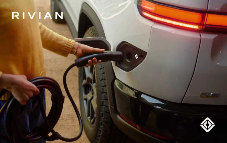 a person charging their Rivian car