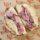 a pastrami sandwich from Little Provence on paper stamped with their logo