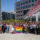 a group of people holding a pride flag