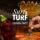 a hand grasping the stem of a cocktail class set beside a lowball glass with the words surf and turf cocktail party in between the two drinks