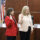 two women hold up their hands to be sworn in for the Arcadia Unified School District board of education