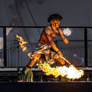 a fire dancer at the Plumeria Festival