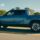 a Rivian RT pickup driving on the road