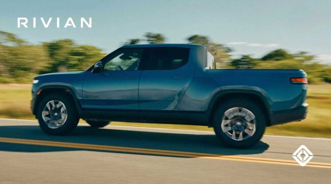 a Rivian RT pickup driving on the road