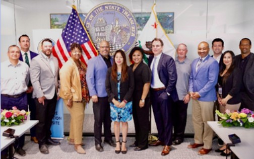 Fiona Ma with a group of people