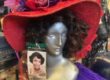 a mannequin head wearing a black wig and red hat