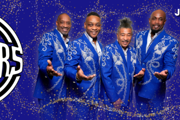 banner for the Spinners musical group