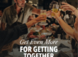 a group of people at Fogo de Chao raising glasses to cheers over a spread of food